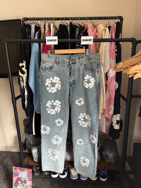 DENIM TEARS BLUE AND WHITE JEANS